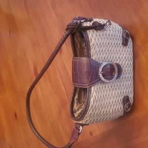 Brighton woven straw purse with brown leather trim.
